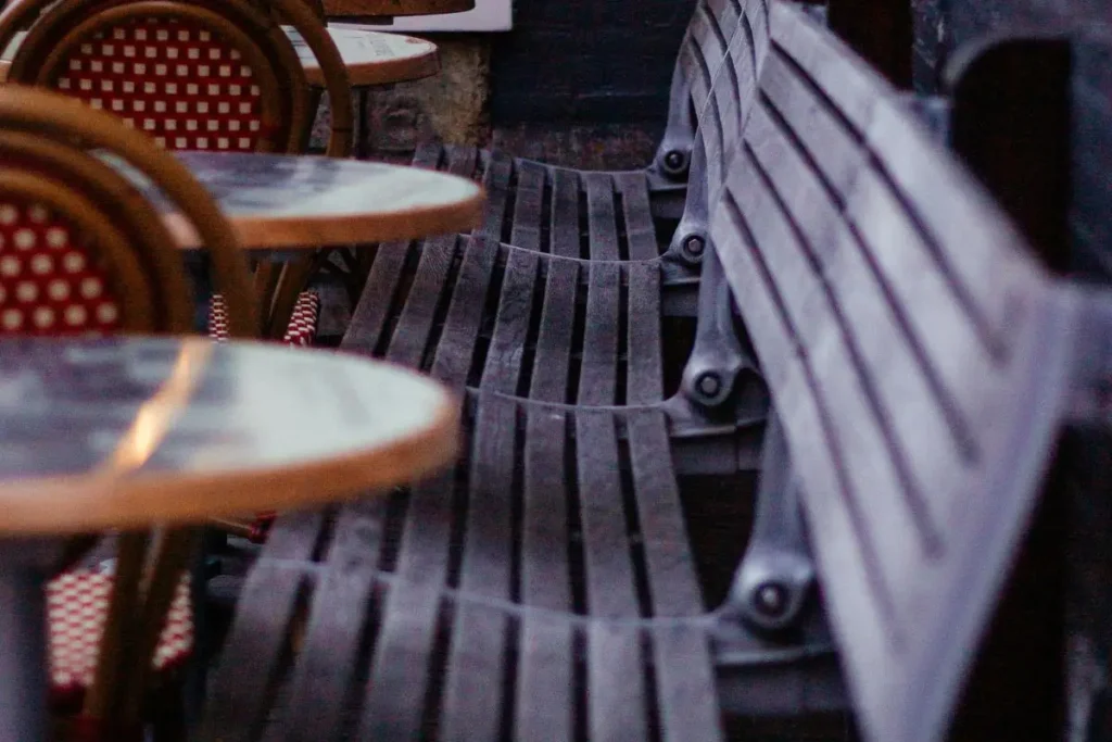 a row of benches and tables